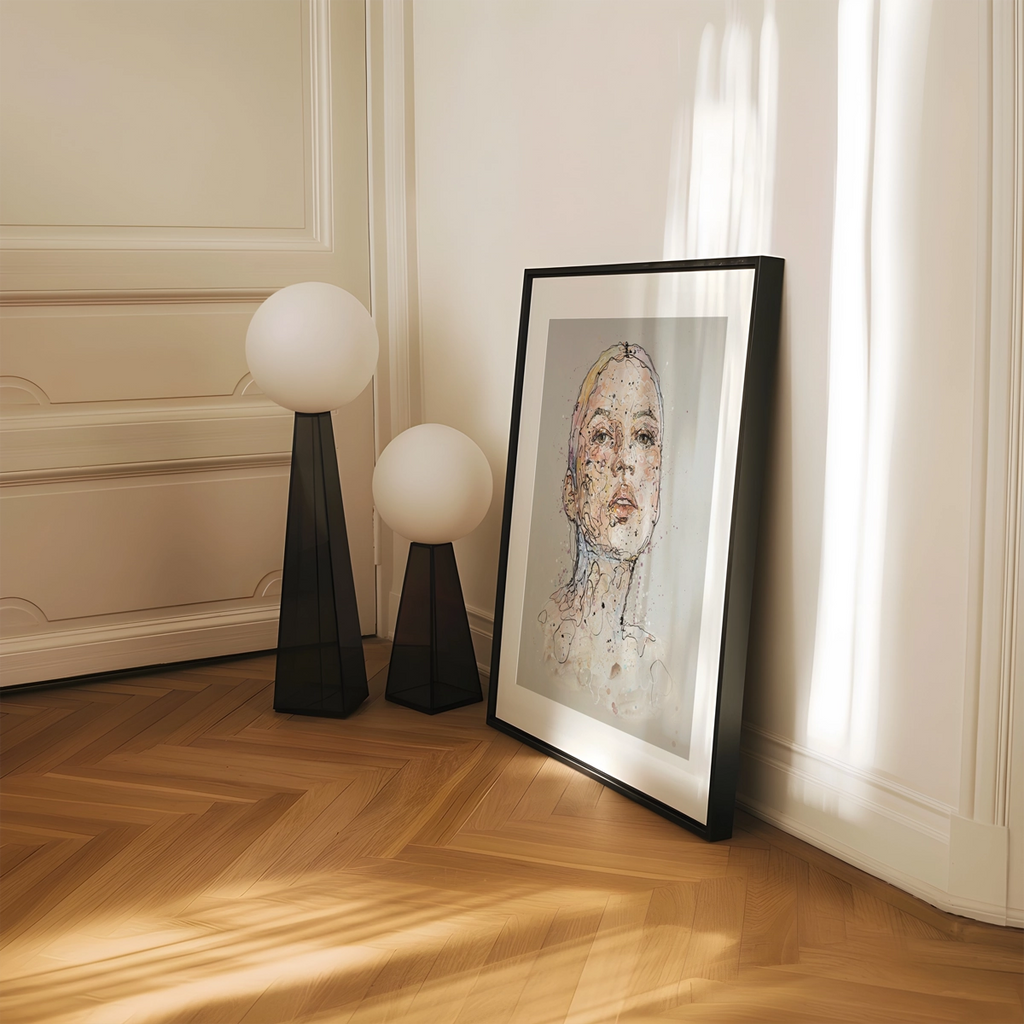 "Feel" er rammet inn med sort list, hvit passepatout og artGlass