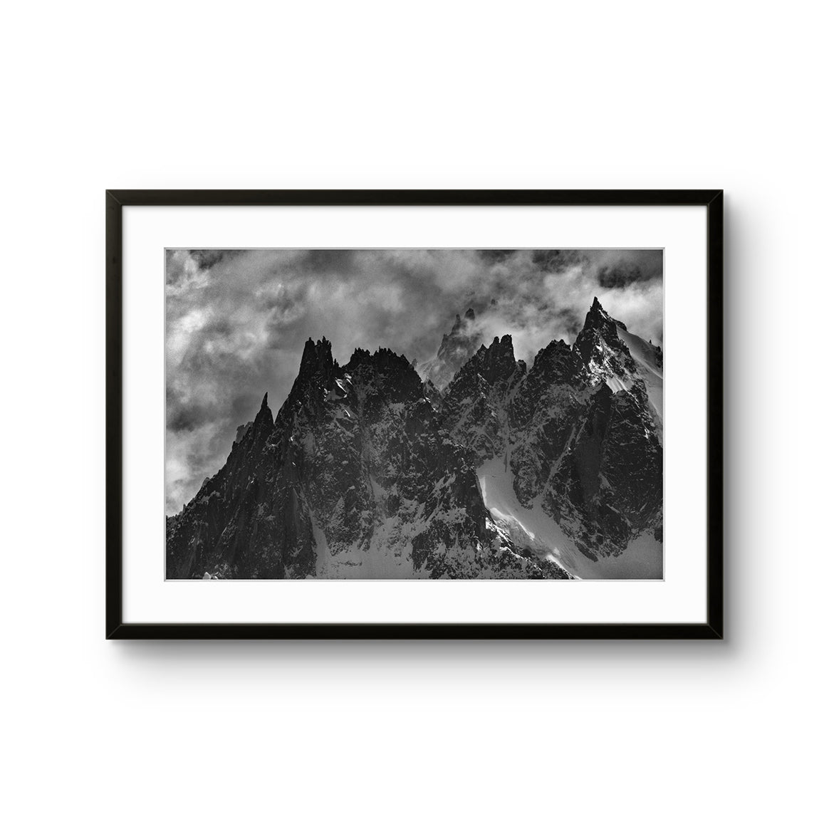 Fine art fotokunsttrykket "First Storm" av den norske fotografen og eventyreren Tormod Granheim, signert og nummerert i et begrenset opplag