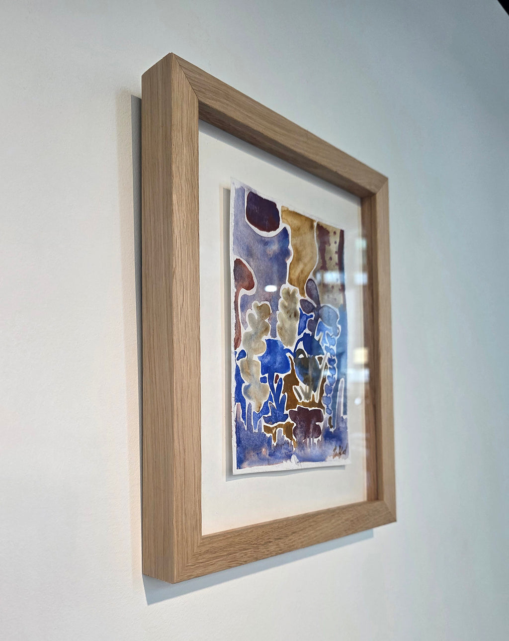 Maleriet "Villblomst" leveres med en ramme i eik og med kunstglass. 